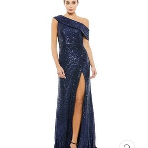 A MacDuggal midnight blue sequined gown